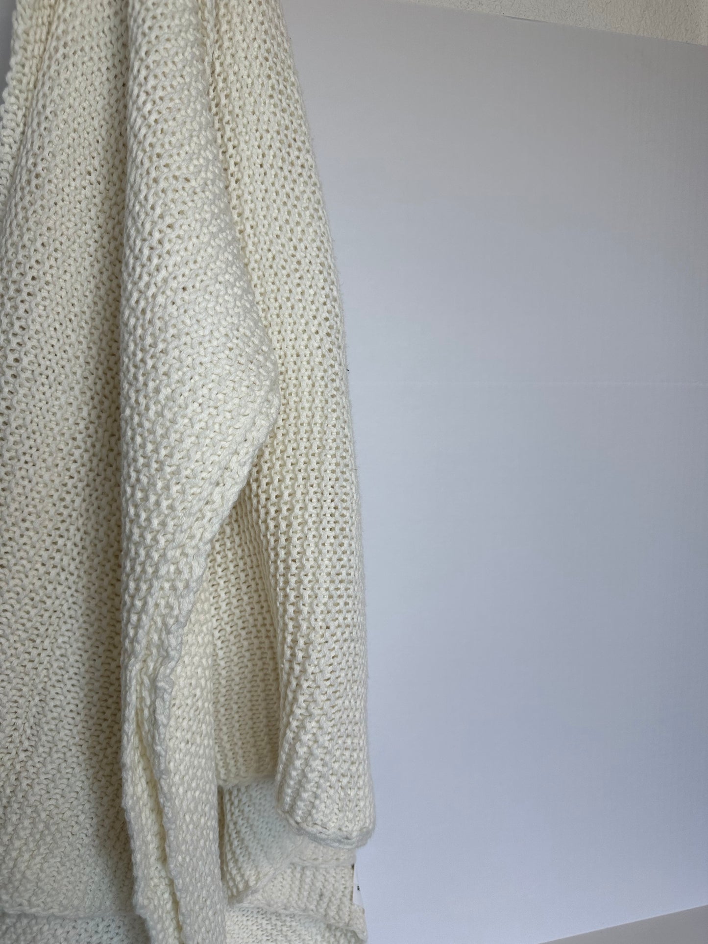 Cream knitted throw blanket