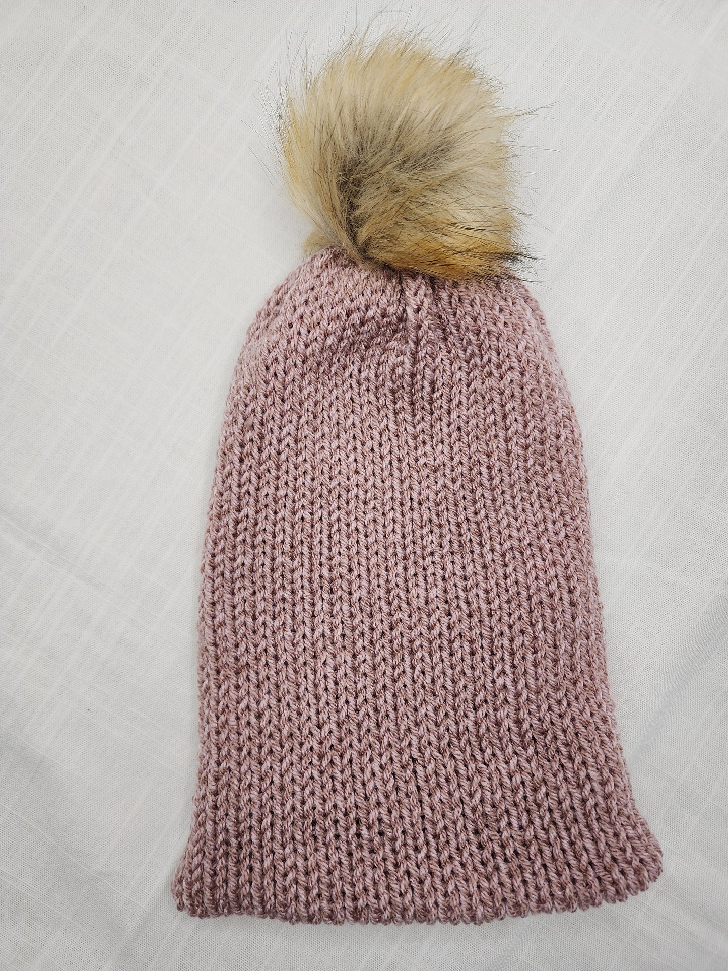 Pink beanie with pompom