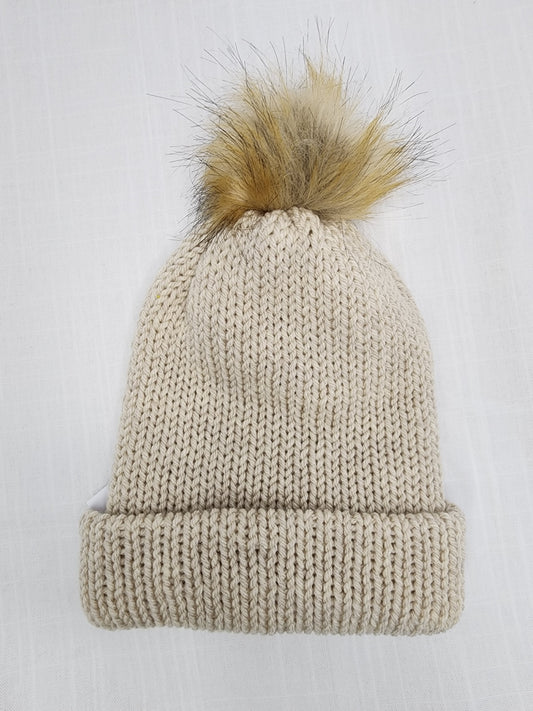 Cream beanie with pom pom