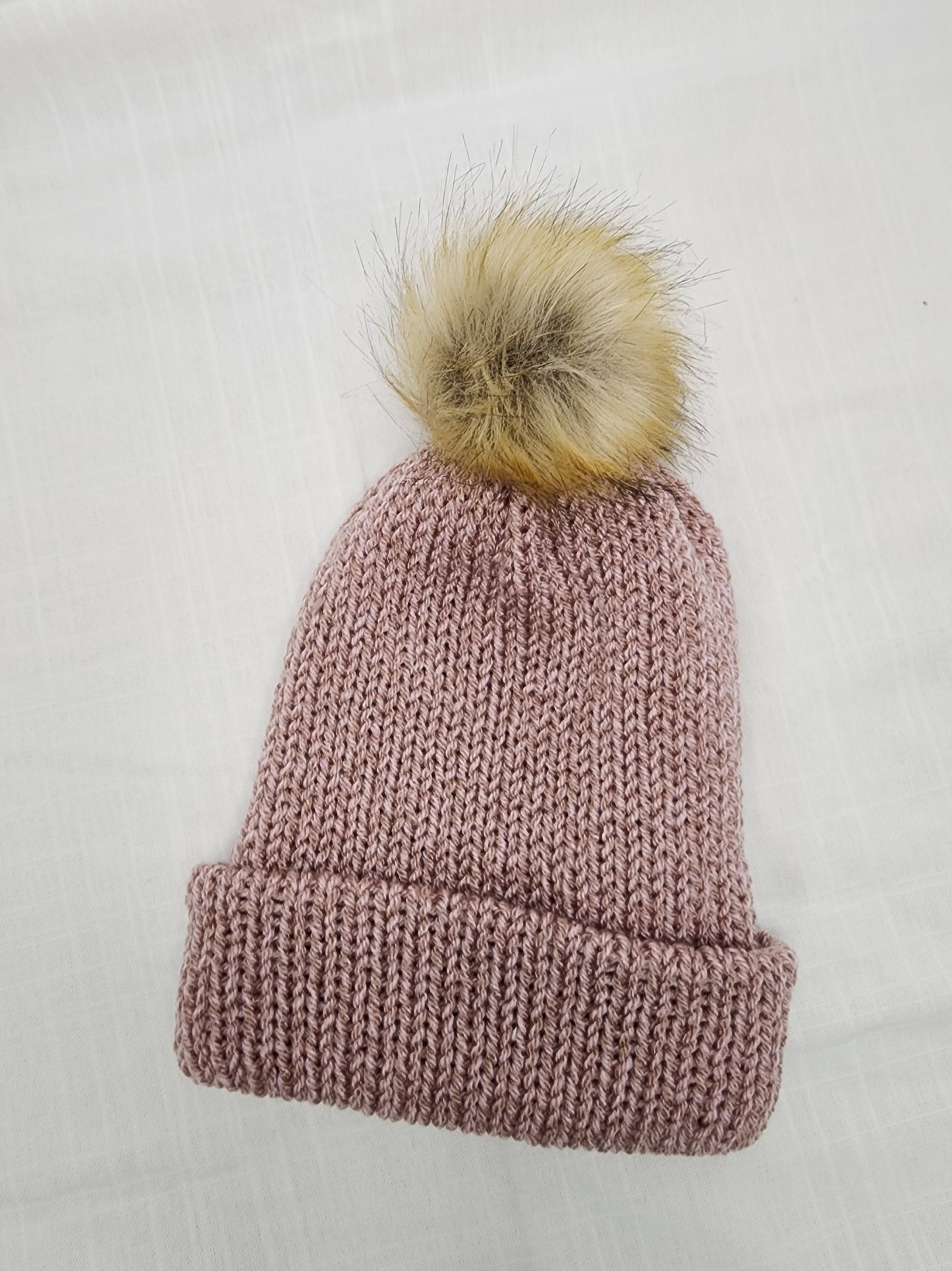 Pink beanie with pompom